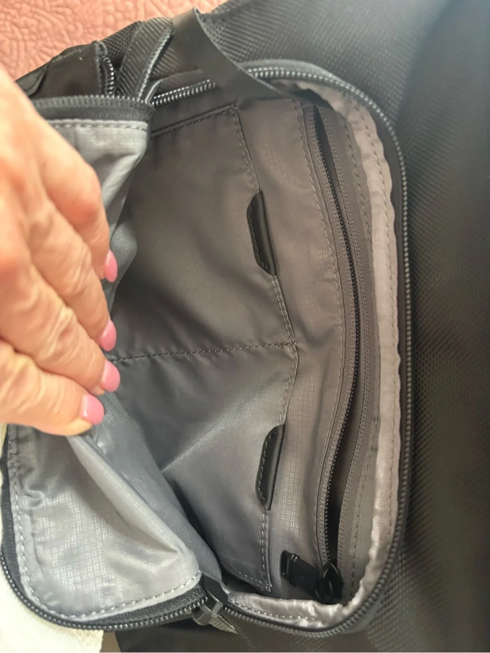 Tumi sleek backpack